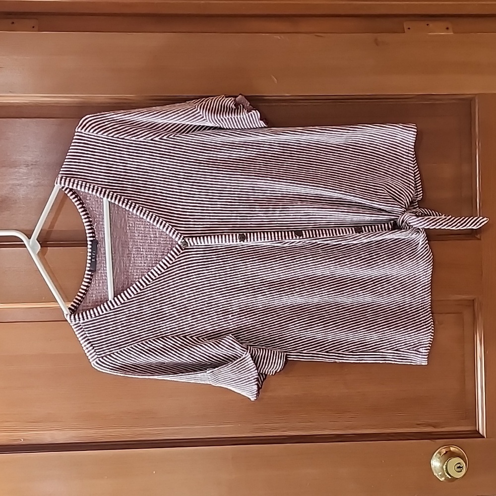 Really cute shirt with tie front and ruffled sleeves